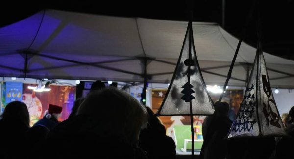 Christmas lights switch on event side stall games