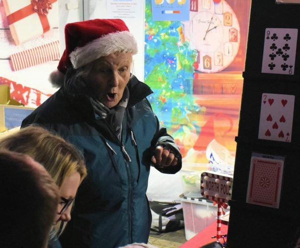 Christmas lights switch on event side stall games