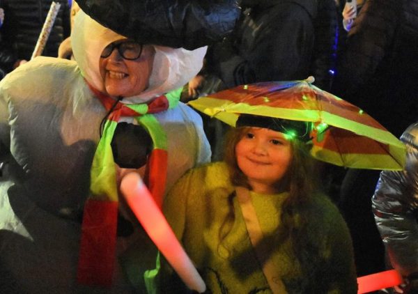 Christmas lights switch on event children in fancy dress