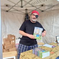 Martyn Harvey with book