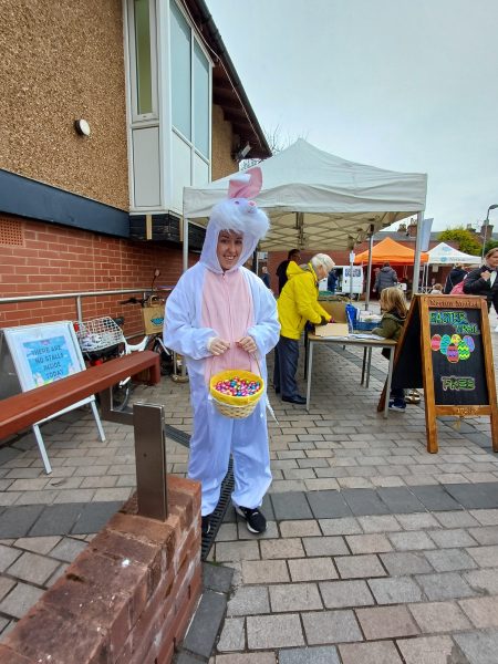 The Easter Bunny with a basket of chocolate eggs